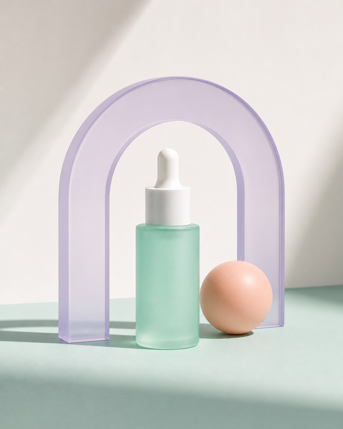 Serum bottle in a pastel still-life arrangement