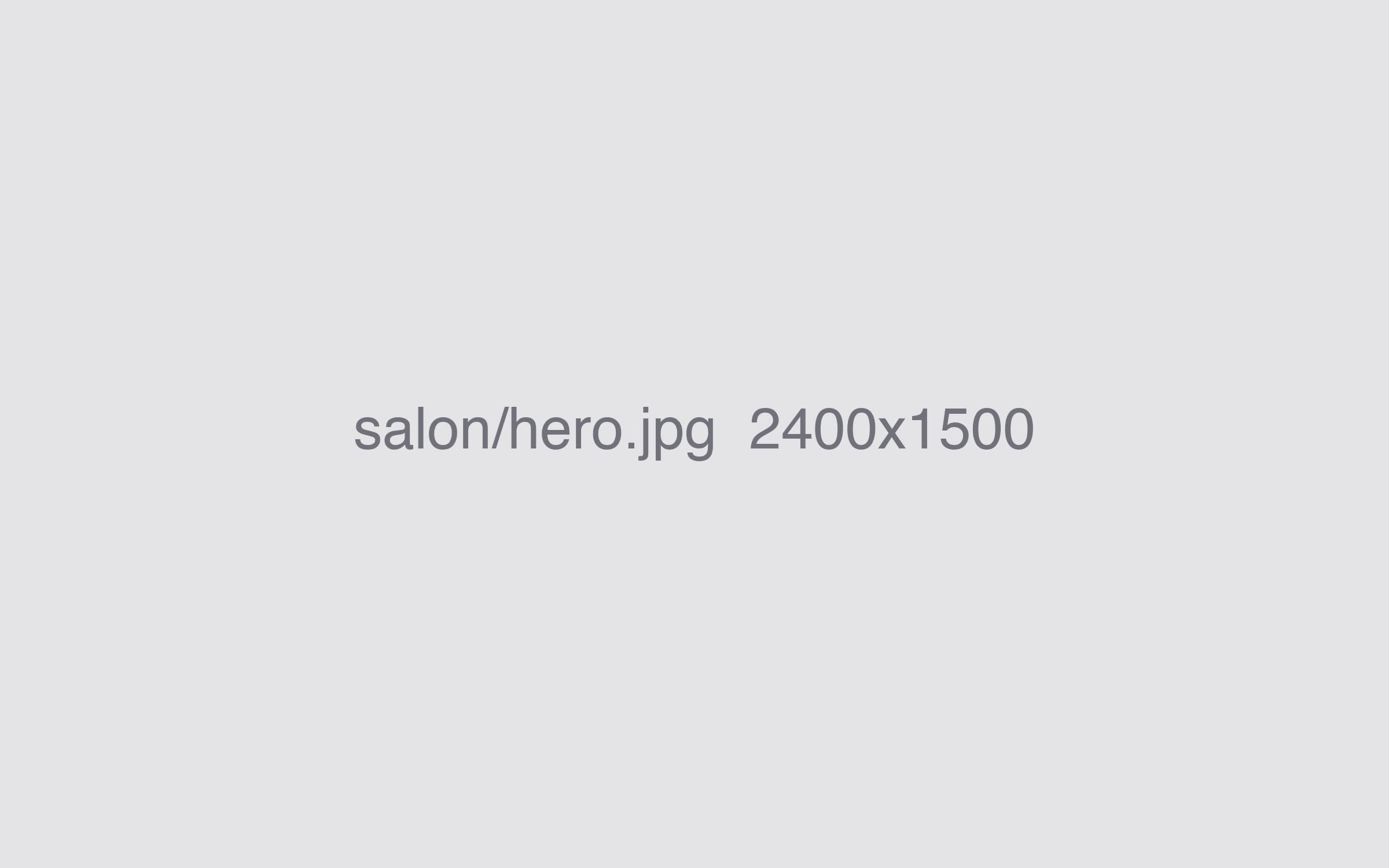 Studio Lora salon interior with styling stations and mirrors